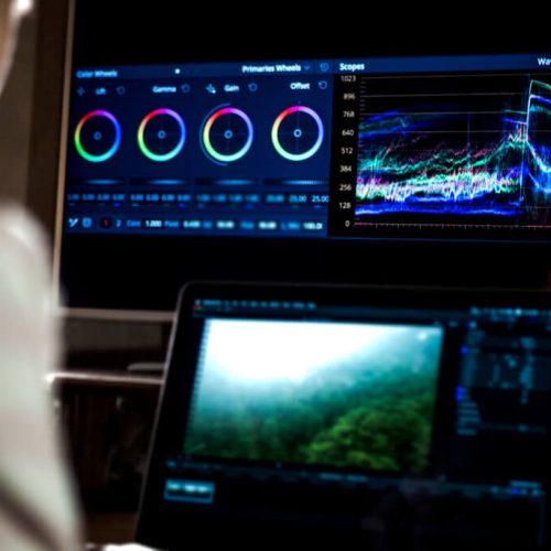 6520394a0740d67366b6852f_young_man_edit_video_in_dark_studio_using_color_grading_tools