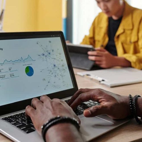 marketing-manager-working-on-laptop-2023-11-27-05-15-56-utc